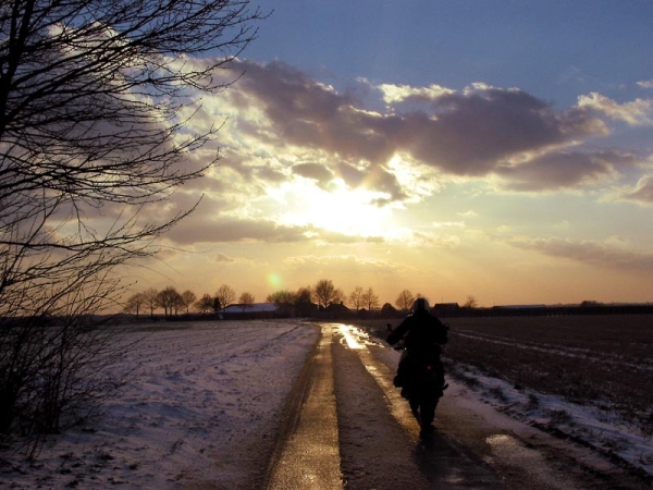 Motorcycle rider and sunset