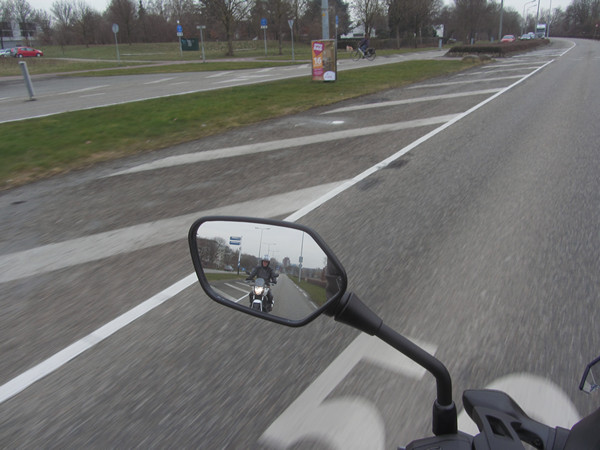 Motorcycle rider in the mirror