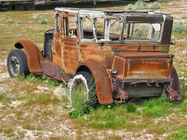 Old car, rusted away