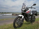 Yamaha Tenere with a boat in the background