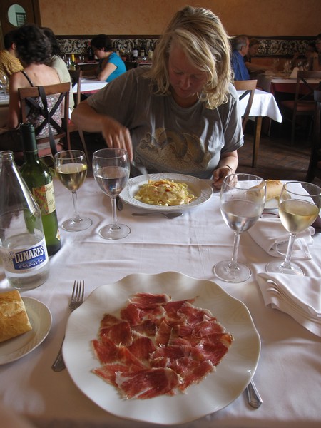 Sylvia at a table with food