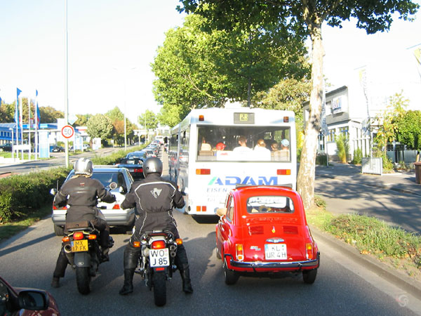 Motorcycle riders in a traffic jam