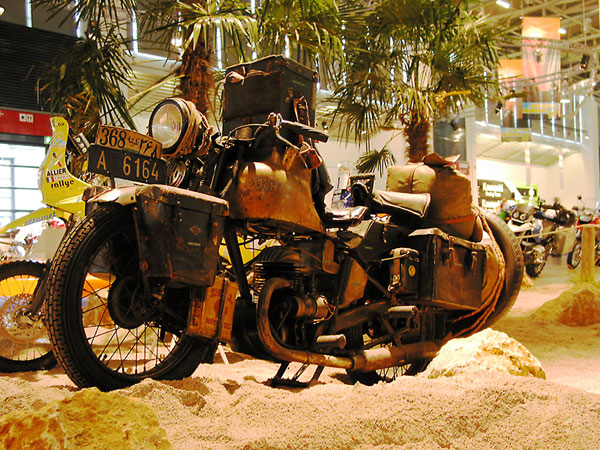 Very old Harley, with leather panniers and bags