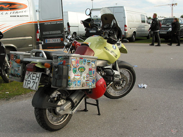 R1100GS with aluminiukm cases with stickers, and jerrycans for extra gas