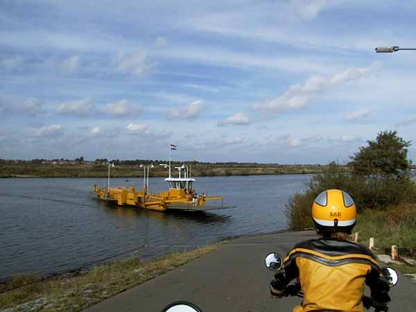 Yellow boat, yellow motorcycle jacket, yellow helmet