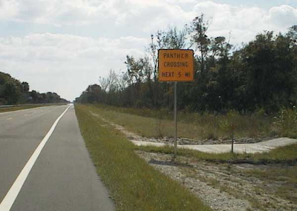 Sign with Panther crossing