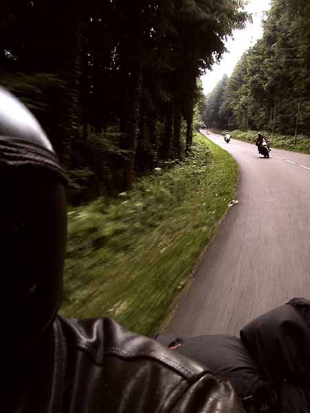 Looking over the shoulder of the photographer: other motorcycle riders in view