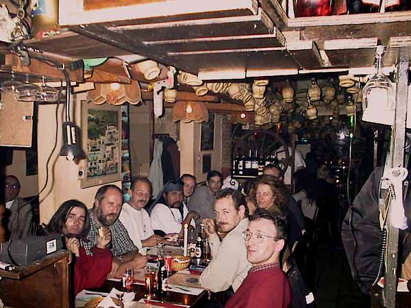 Motorcycle riders in a Pizzeria