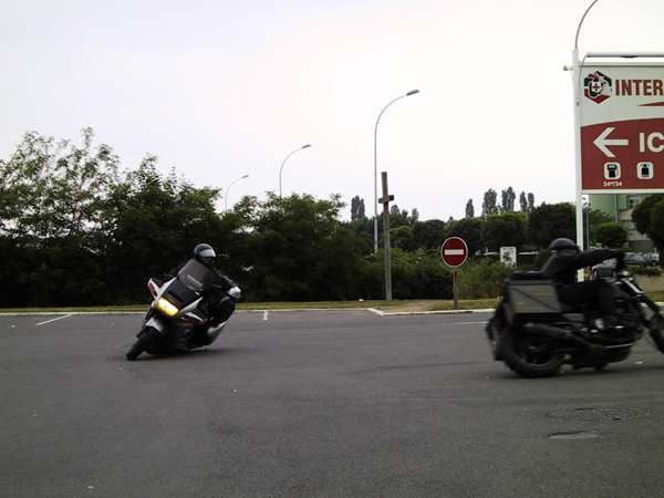 Pan European and Honda Magna riding tight corners