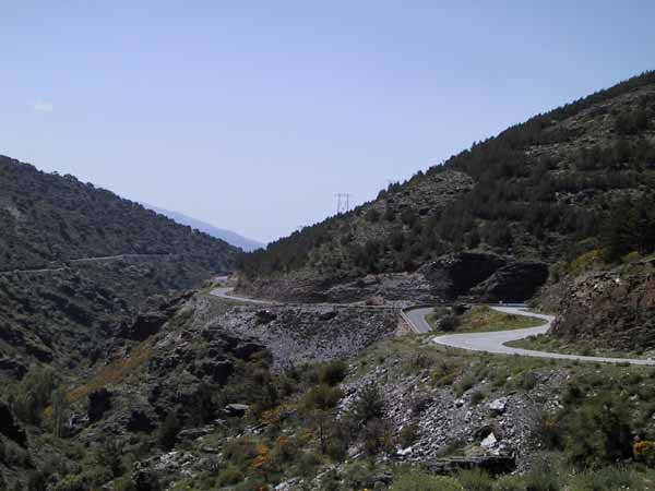 View on a road alongside a hill