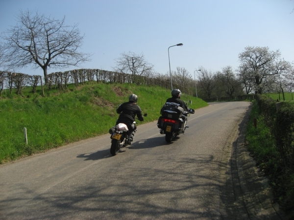 Motorcycle rider tries to overtake another motorcycle rider