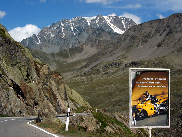 Warning for motorcycle riders in three languages