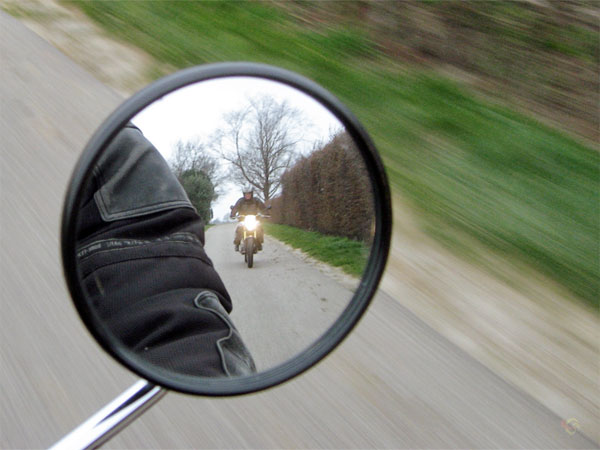 motorcycle, visible in a mirror
