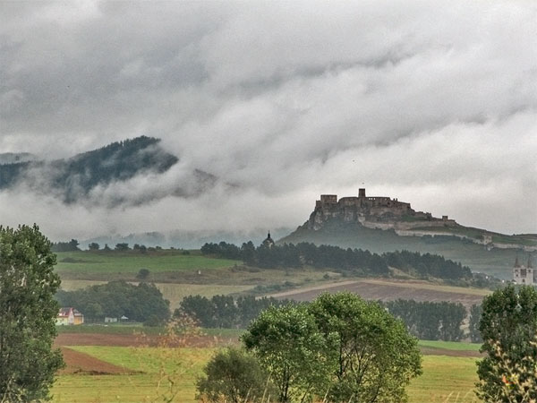 Dark clouds and a castle